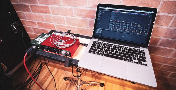 Ableton Live running on a Macbook Pro controlling Backing Tracks for a band