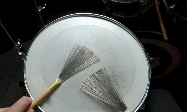 Drum brushes on a snare drum